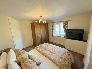 Bedroom One- click for photo gallery